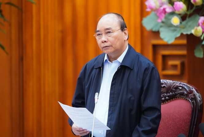 Thủ tướng Nguyễn Xuân Phúc tại cuộc họp sáng 26/3. Ảnh: VGP Tin tức xã hội mới nhất ngày 27/3/2020: Dừng hoạt động hội họp, sự kiện tập trung trên 20 người