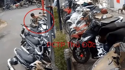 Clip: Tên trộm phá khóa lấy đi xe SH mà bảo vệ không hề hay biết vì mải dắt xe cho khách