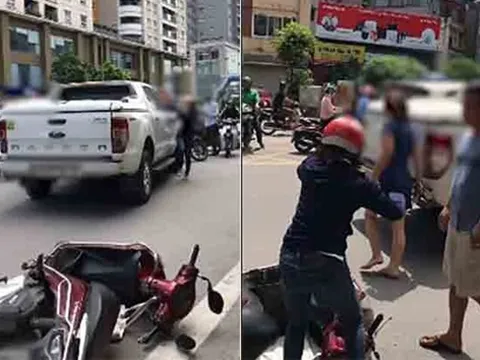 Xôn xao clip đánh ghen trên đường Tố Hữu (Hà Nội): Chồng giữ chặt vợ để bồ xách guốc bỏ chạy
